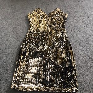 Black and gold sequins dress
